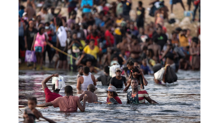 Large Migration Surge Crosses Rio Grande Into Del Rio, Texas