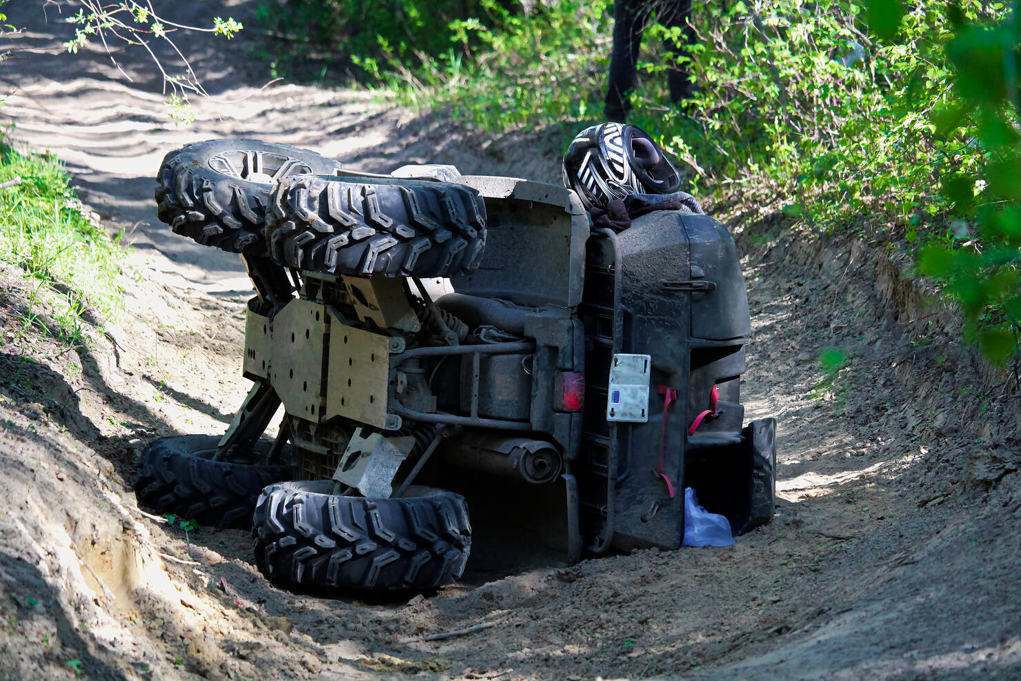 A quad on its side after it has been accidentally flipped