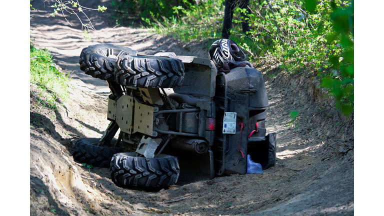A quad on its side after it has been accidentally flipped