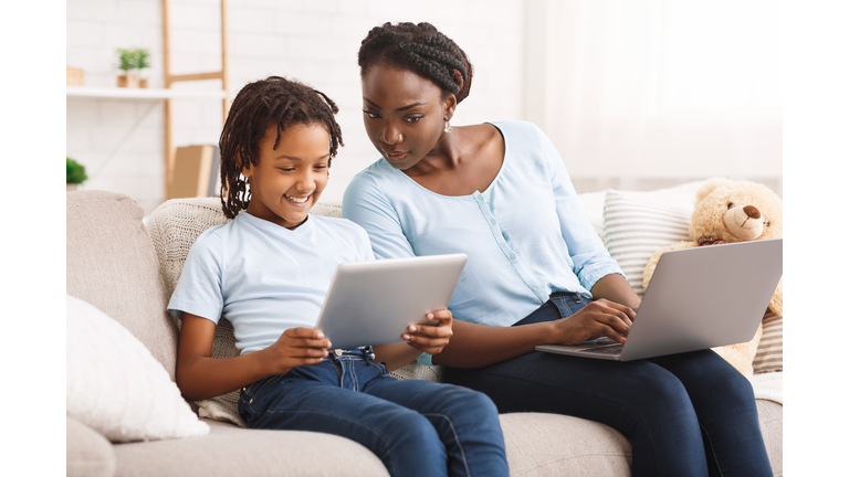 Caring mom providing children's online privacy protection