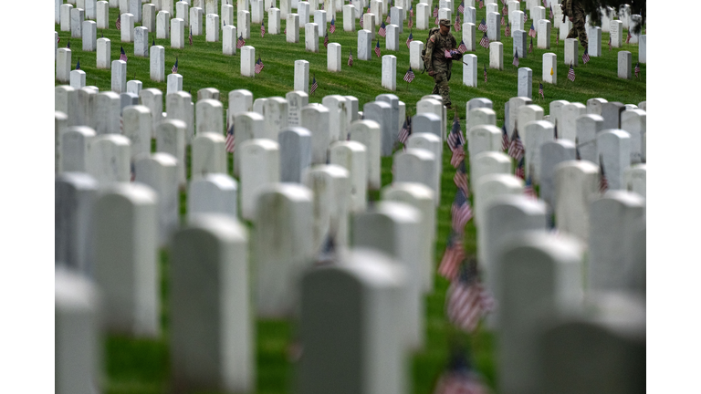 Annual Flags-In Event Held At Arlington Cemetery Ahead Of Memorial Day