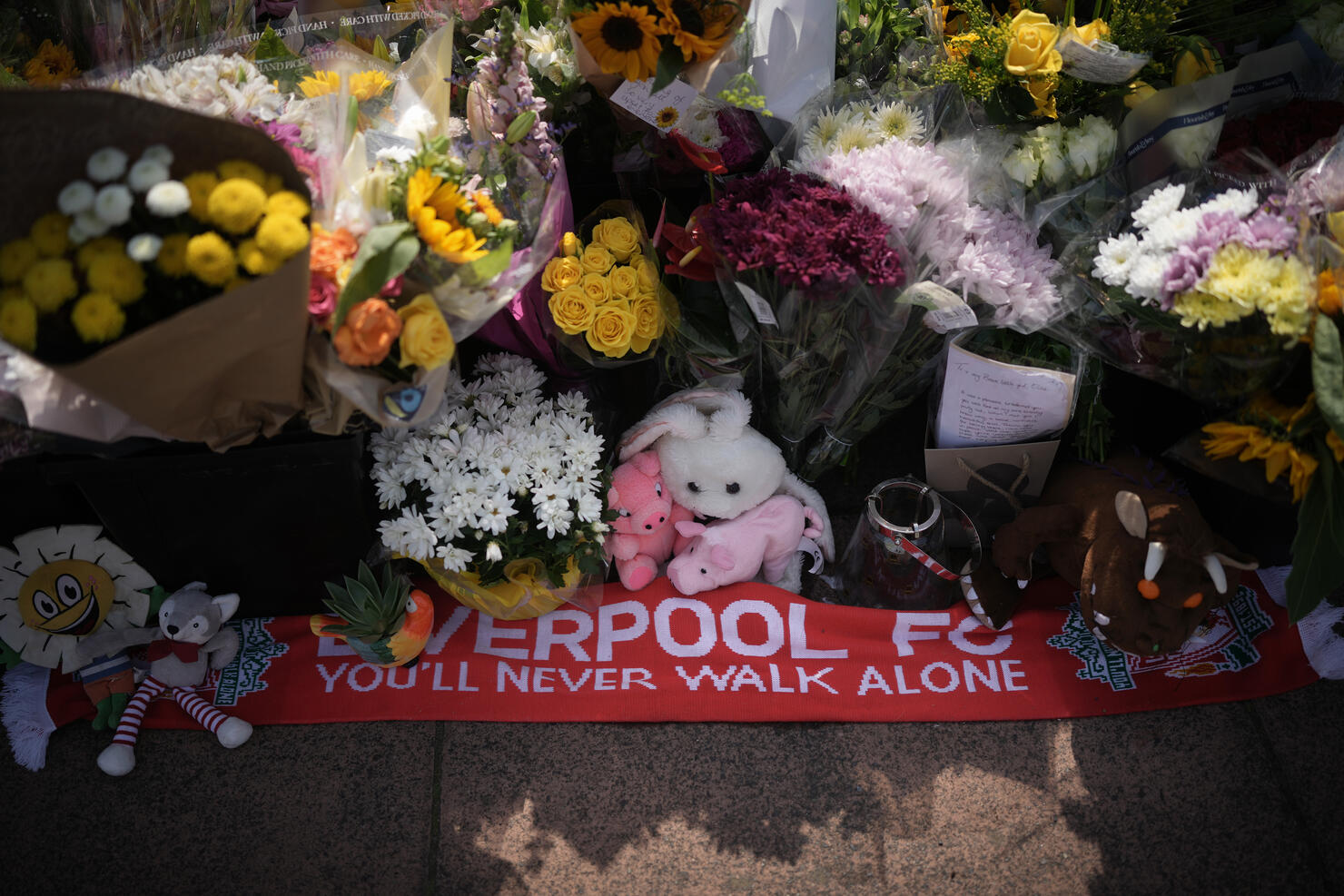 Flowers And Tributes Are Left At The Scene Of Monday's Stabbings In Southport