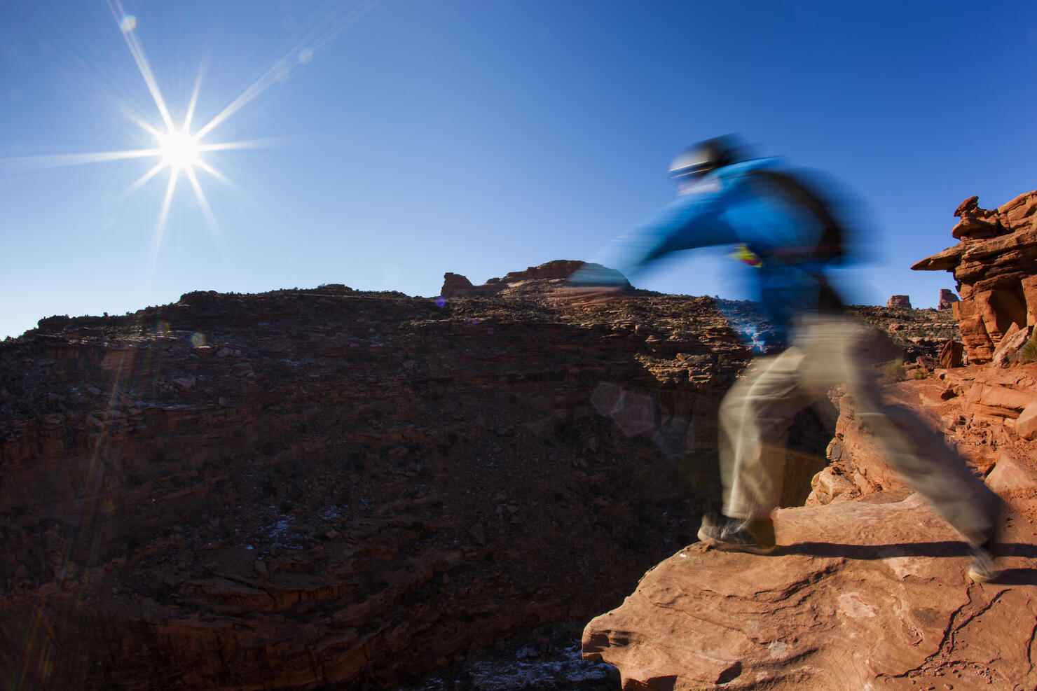 A person about to jump off a cliff.