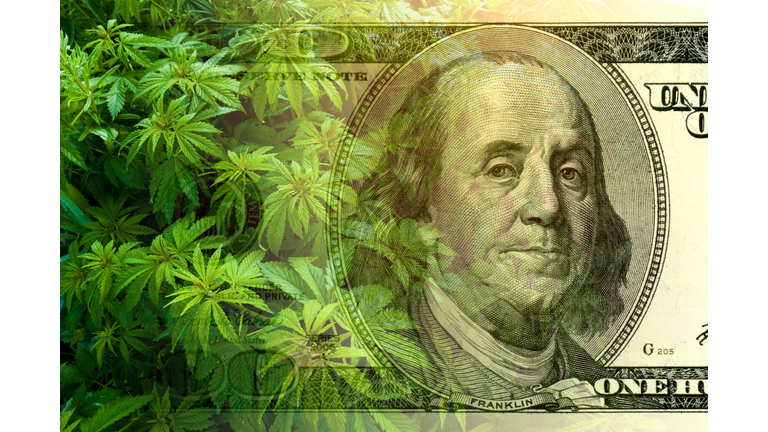 Cannabis leaf on the background of 100 dollar bill