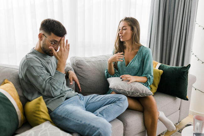 Shot of a young couple having an argument at home
