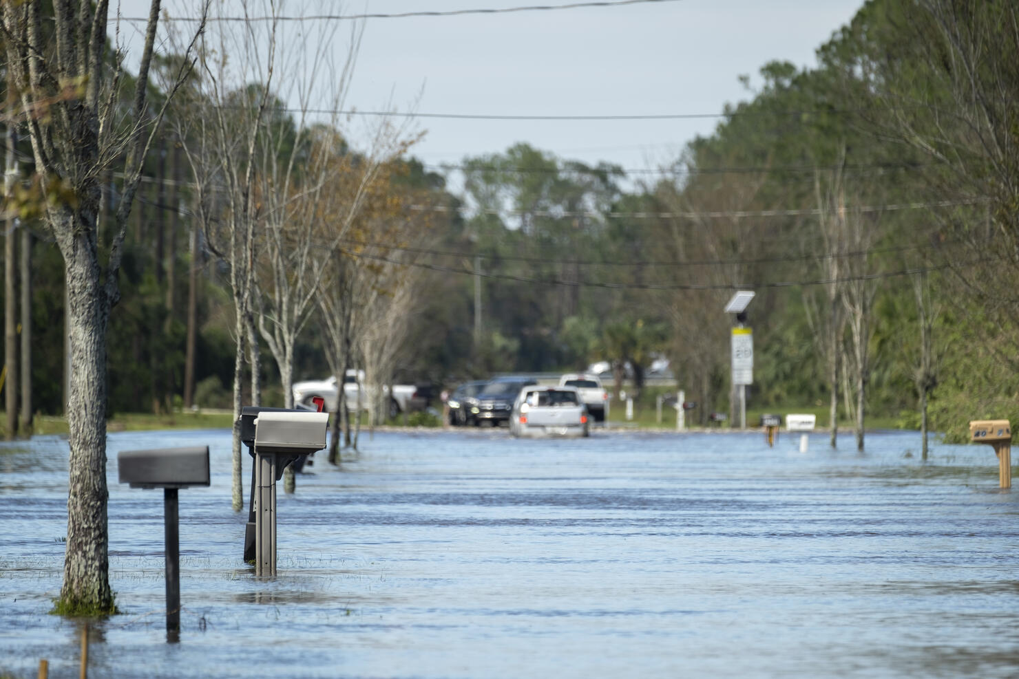 Hurricane flooded street in Florida residential area. Consequences of natural disaster