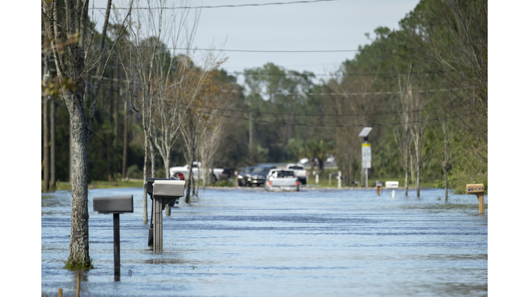 Hurricane flooded street in Florida residential area. Consequences of natural disaster