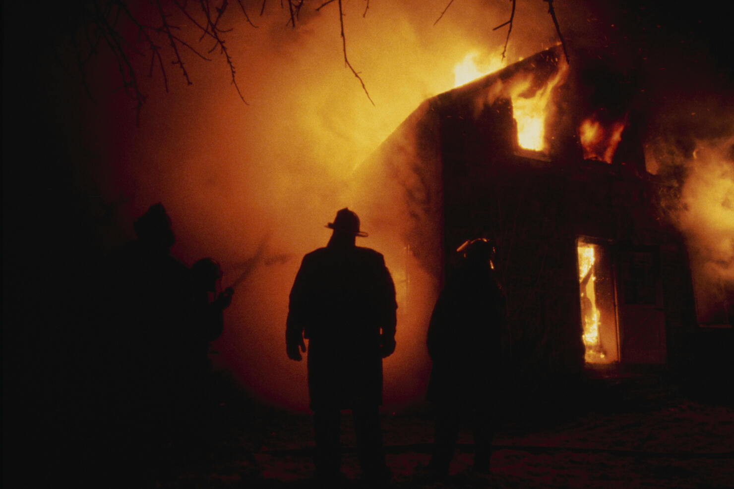 Firefighter By Flaming House