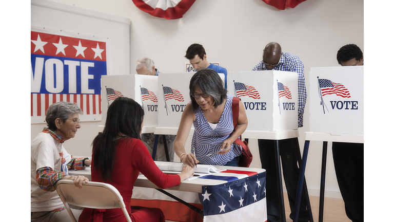 Voters voting in polling place