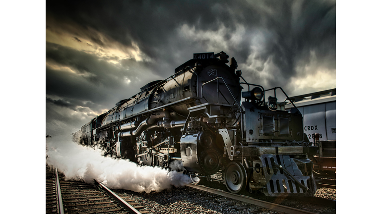 Union Pacific Big Boy Steam Locomotive No. 4014 under a dramatic cloudy sky