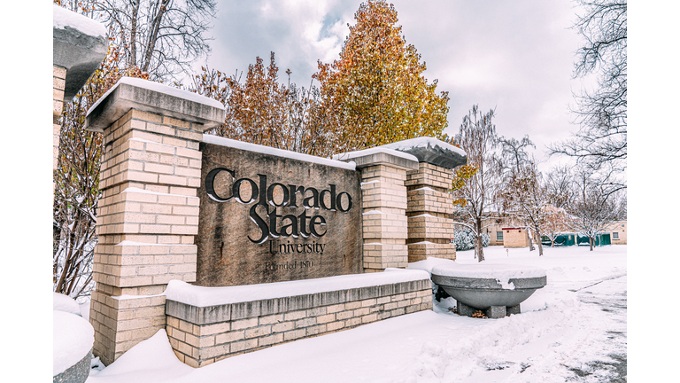 Close-Up Shot of the Entrance Sign at Colorado State University at the Oval on a Snowy Day at CSU in Fort Collins, Colorado