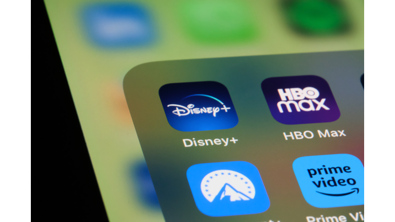 Disney+ and HBO Max streaming service app icon on screen