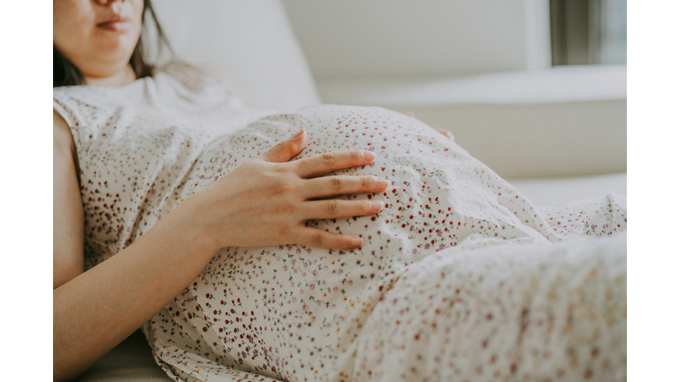 Close-up of pregnant woman's belly