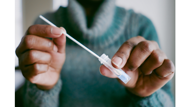 Woman Takes At-Home COVID Test