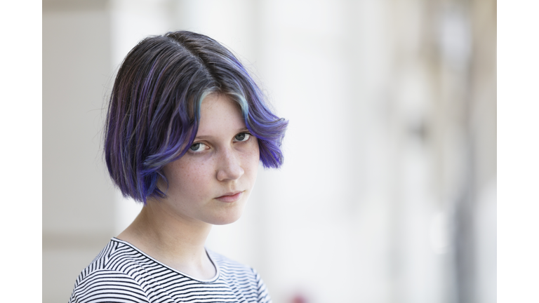 Teenage girl with purple hair