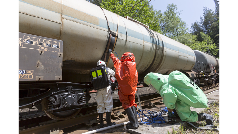 Toxic chemicals acids emergency team train crash