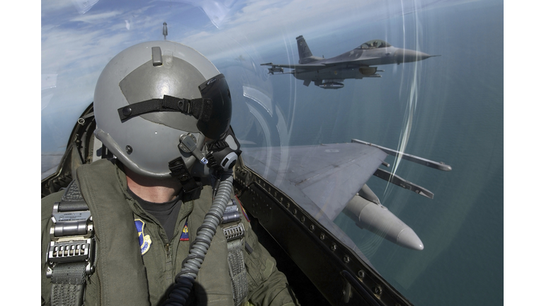 F-16 Fighting Falcons from the 62nd Fighter Squadron, Luke Air Force Base, Ariz., fly over southern Florida during a flight from Luke to Key West, Fla., Oct. 16, 2004.