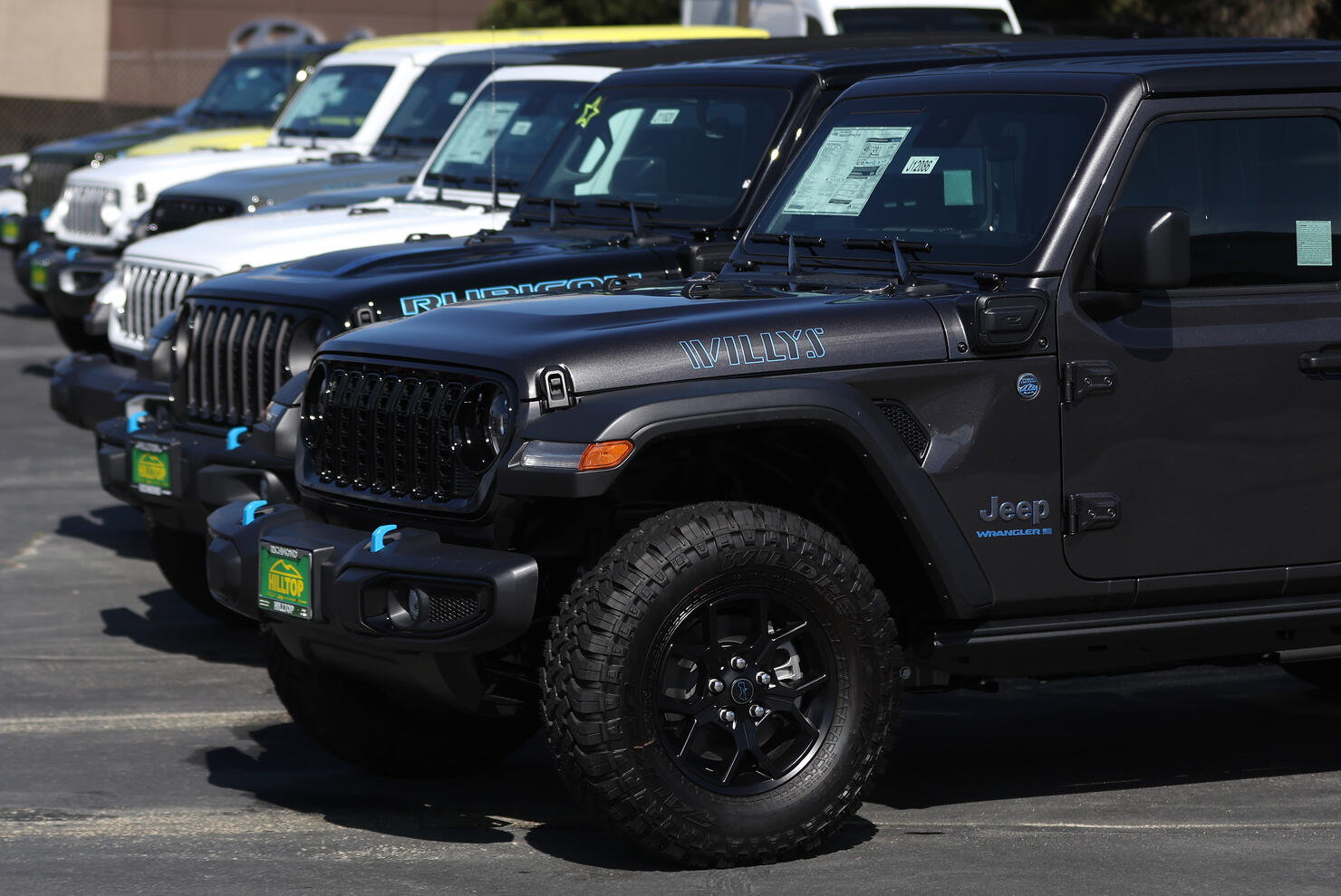 U.S. Car Companies Shift Focus From Electric Vehicles To Hybrids