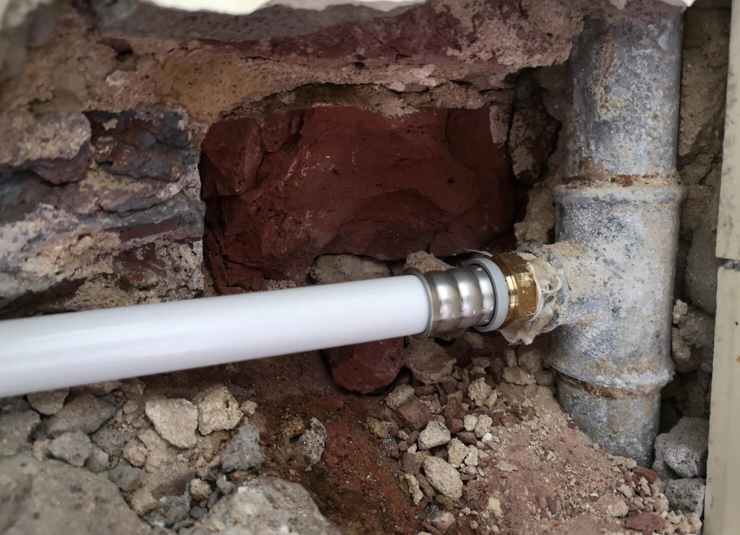 Shot of old water pipes in the wall