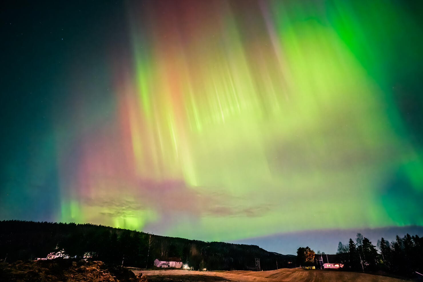 Colourful Aurora Borealis dancing over the sky