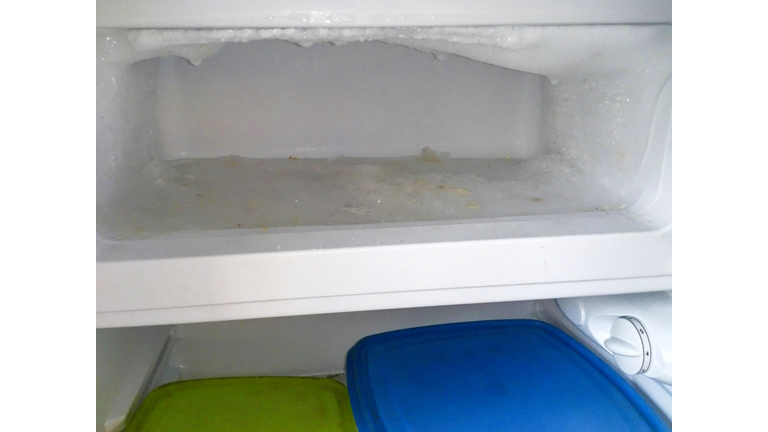 Empty Ice Box in a fridge  freezer