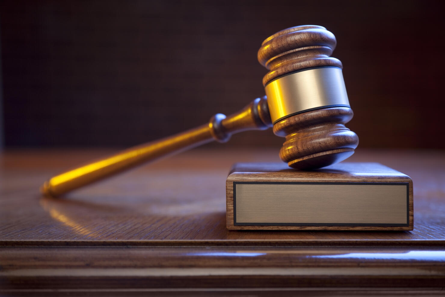 Justice Gavel And Block On Judge's Bench With Blank Plaque
