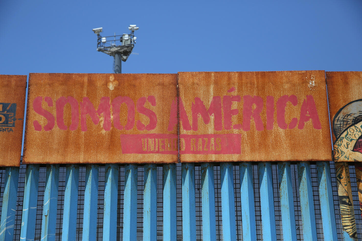 Mexicans Meet Separated Family Members Through U.S.-Mexico Border Fence In Tijuana