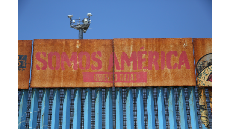 Mexicans Meet Separated Family Members Through U.S.-Mexico Border Fence In Tijuana