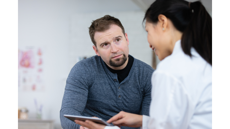 Man listening to results