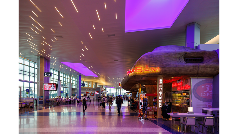 Passengers at the George Bush International Airport Terminal C in Houston, Texas