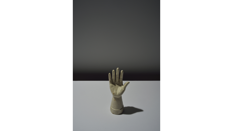 Conceptual image / White hand of sculpture