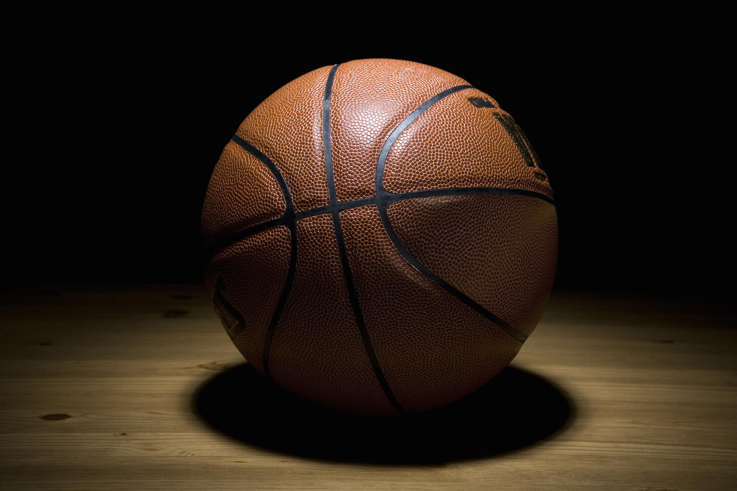 A spot lit basketball