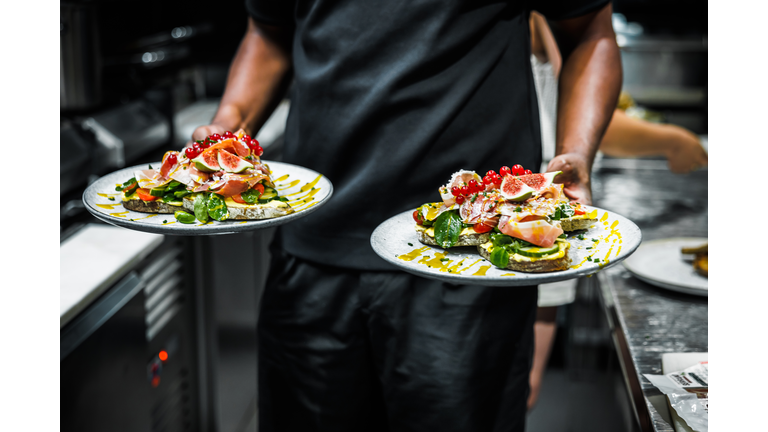 Chef Serving Gourmet Toast Delights