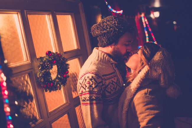 Kissing under the mistletoe