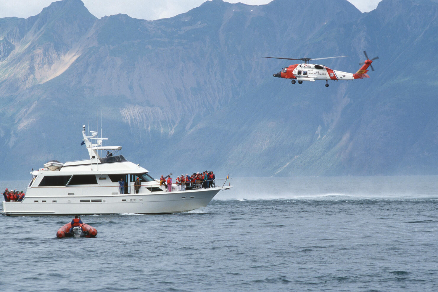 Coast Guard Helicopter Bringing Equipment to Tourist Boat