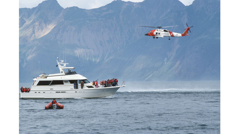 Coast Guard Helicopter Bringing Equipment to Tourist Boat
