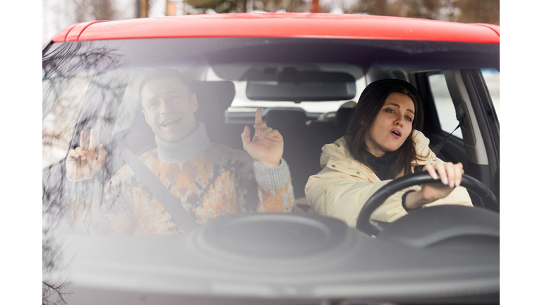 Couple Singing in Car