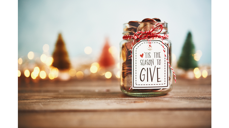 It's the season to give. Donation jar with money