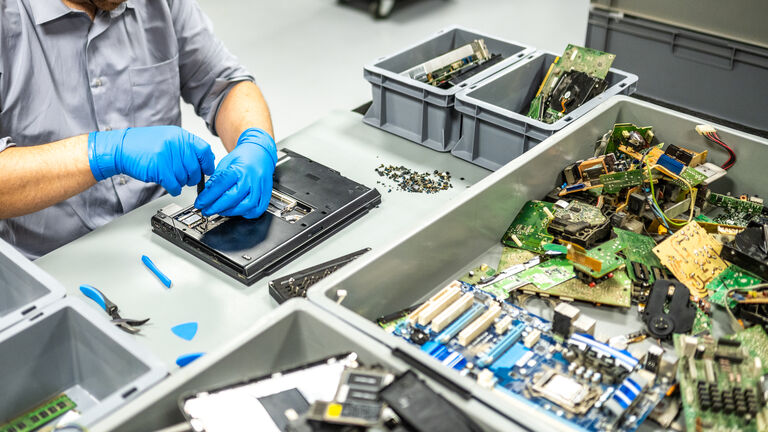 Man repairing laptop