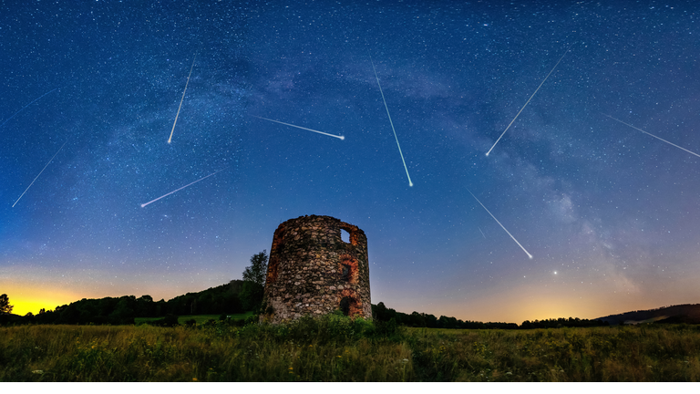 Meteor Shower and the Milky Way with old ruin