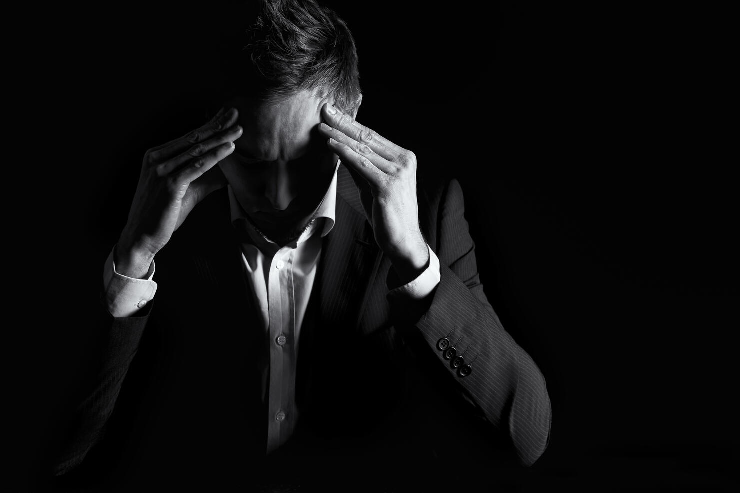 Businessman thinking hard.