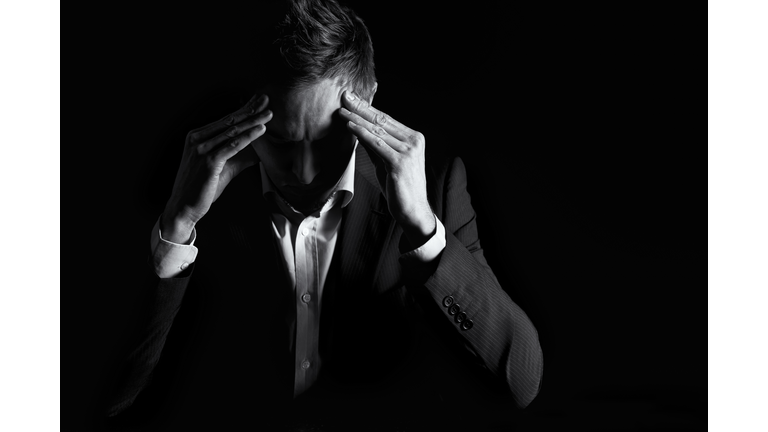 Businessman thinking hard.