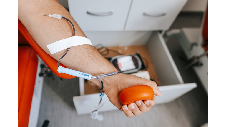 Male blood donor at the lab