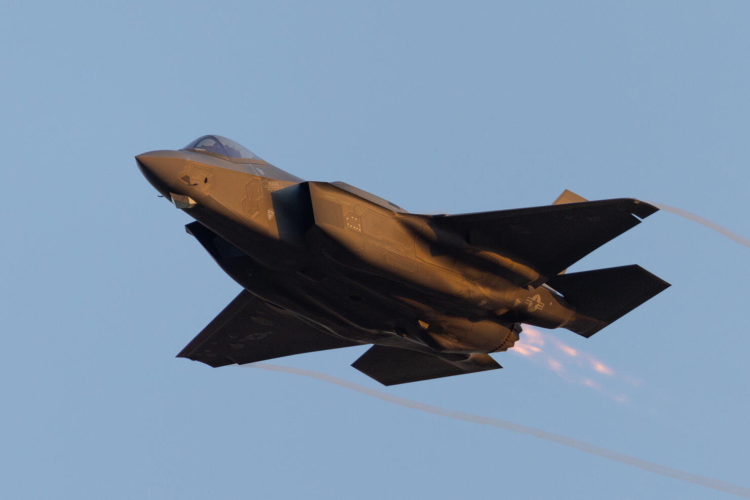 Close view of a F-35A Lightning II approaching in beautiful sunset light