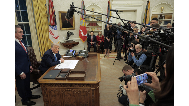 President Trump Signs Executive Orders In The Oval Office