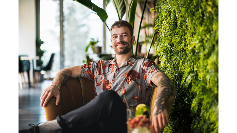 Relaxed man in urban jungle