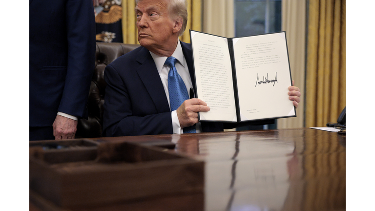 President Trump Signs Executive Orders In The Oval Office