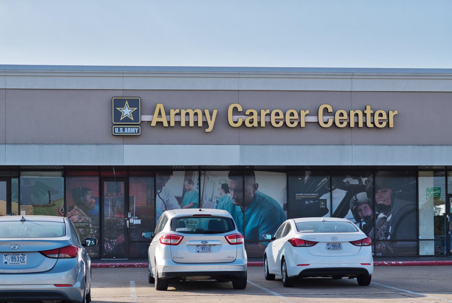 Army Career Center storefront exterior and parking lot in Houston, TX.