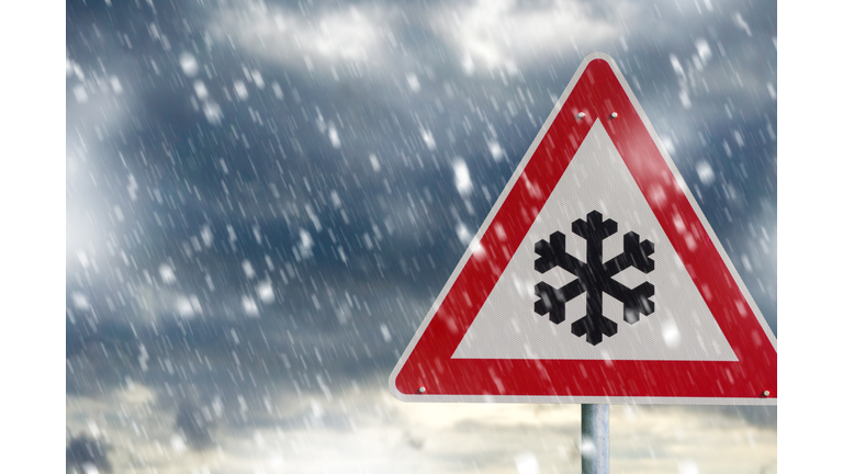 winter driving - warning sign - risk of snow and ice