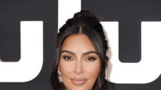 Kim Kardashian Post Questionable Bikini Pic at 14